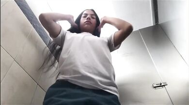 Hot latina trembles fingering herself in university bathroom