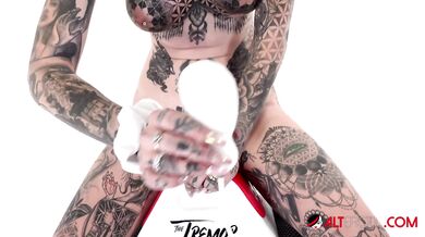 Blonde Aussie with tattoos gets off using toy while her thighs tremor