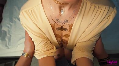 MILF’s oiled tits jiggle my face in tight dress