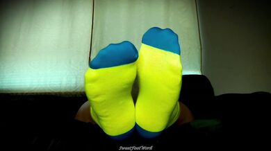 BBW foot goddess teases stretched neon socks over her size 11W feet