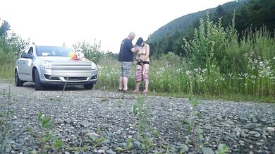 The hot mature mom gets pissed on outside by her nasty bitch