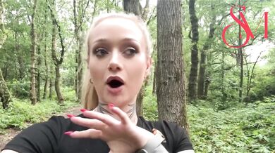 British skinny blonde fingering her tattooed pussy in the woods