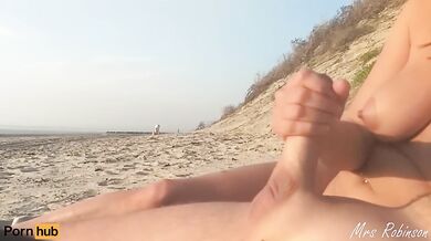 Mrs Robinson gets her ass plugged in public and gushes all over the beach