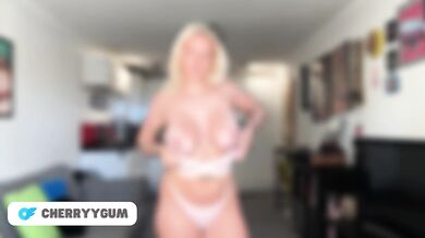 British blonde teen shows off her huge natural tits in a micro bikini haul